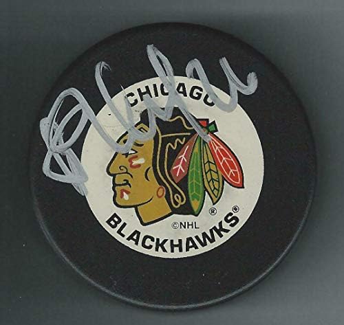 Алекс Жамнов подписа шайбата Чикаго Блекхоукс - за Миене на НХЛ с автограф